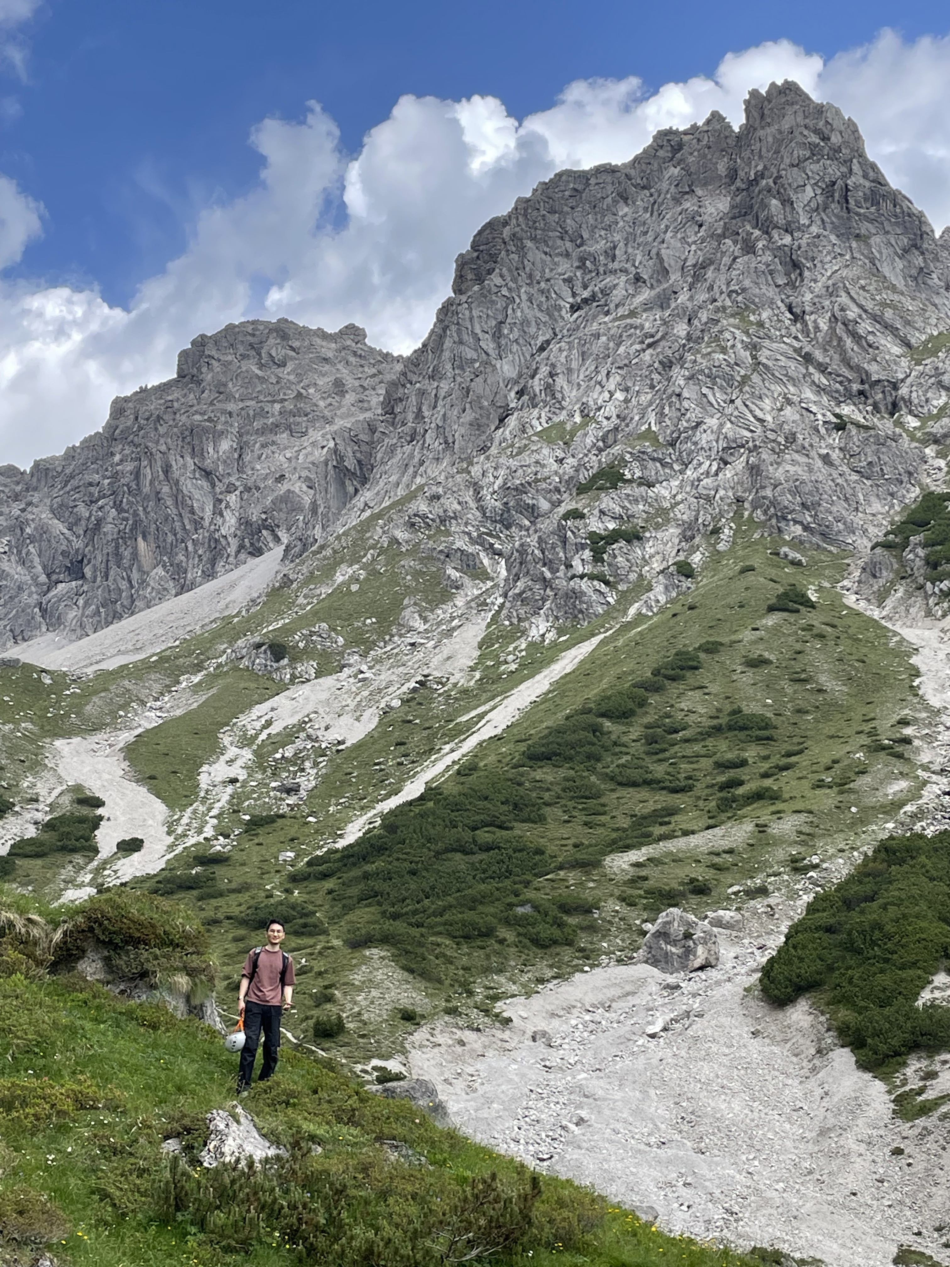 Hiking approach to the mountain crag